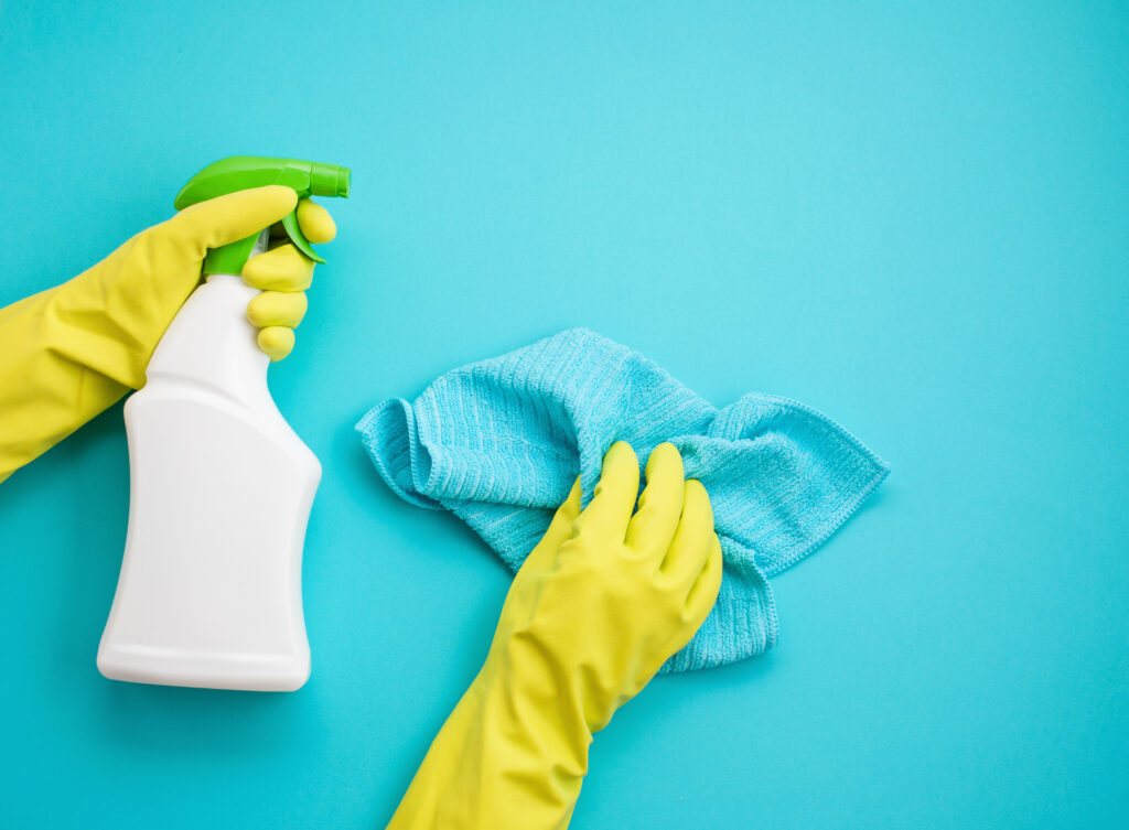 Detergents and cleaning accessories in pastel color